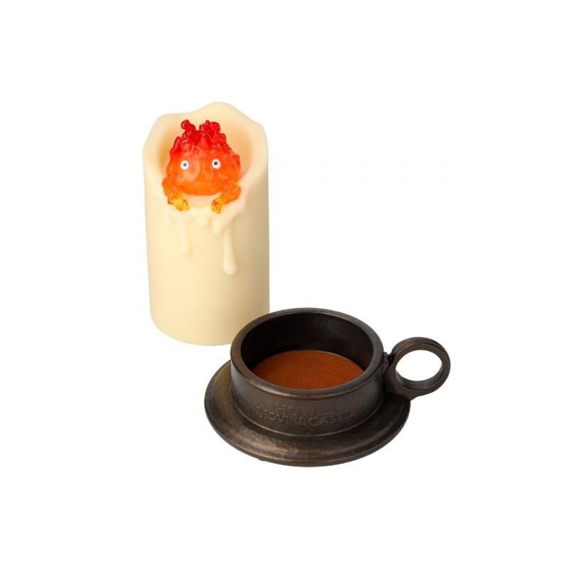 Il castello errante di Howl con Calcifer illuminato e candela da 13 cm